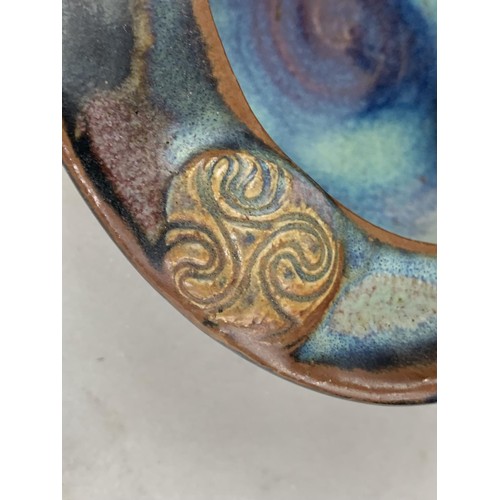 716 - AN IRISH POTTERY GLAZED DISH