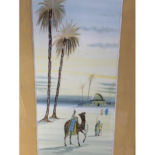 425 - A PAIR OF ARABIAN WATER COLOURS IN  GILT MOUNTS AND EBONY FRAMES 23X11.5