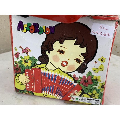 725 - VINTAGE BOXED KIDS ACCORDION