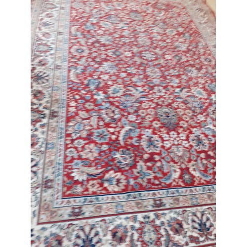 71 - RED PATTENED RUG 79 X 54