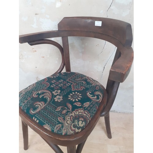 88 - A BENTWOOD ARMCHAIR