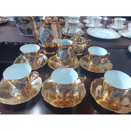 90 - A GILT LUSTRE TEA SERVICE