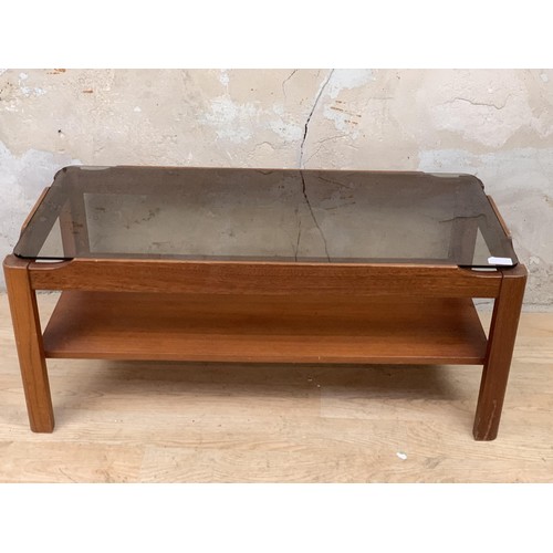 93 - A RETRO TEAK GLASS TOP COFFEE TABLE