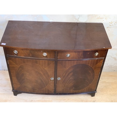 1 - A MAHOGANY 2 DOOR 2 DRAWER CUPBOARD