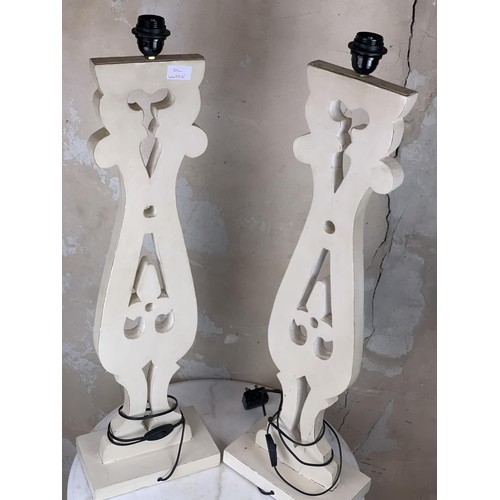 7 - A PAIR OF CARVED WOODEN DESIGNER LAMPS 33