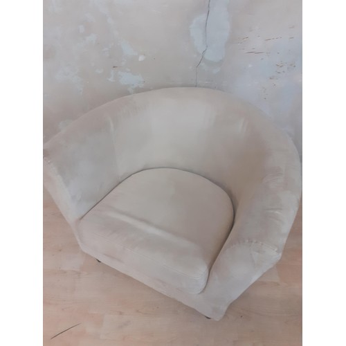 111 - A SUEDE TUB CHAIR