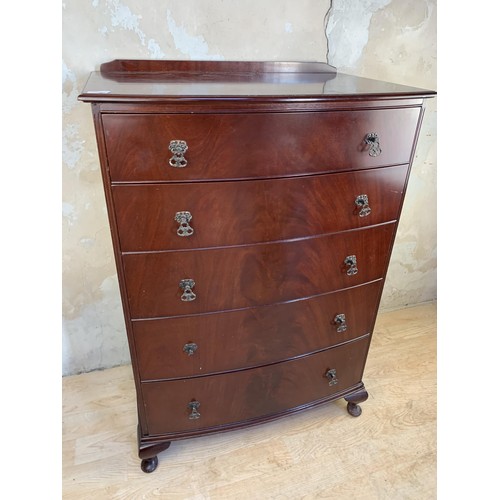 119 - A BOWED MAHOGANY 5 DRAWERED CHEST ON CAB LEG