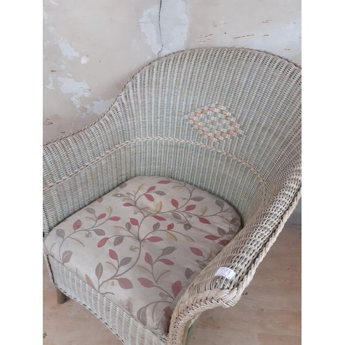 32 - A WICKER TUB CHAIR