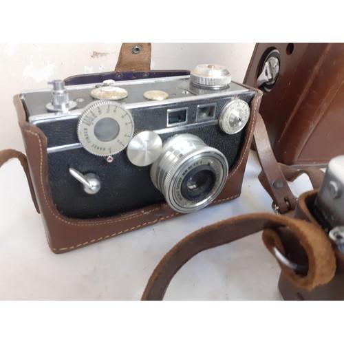 132 - 4 VINTAGE CAMERAS