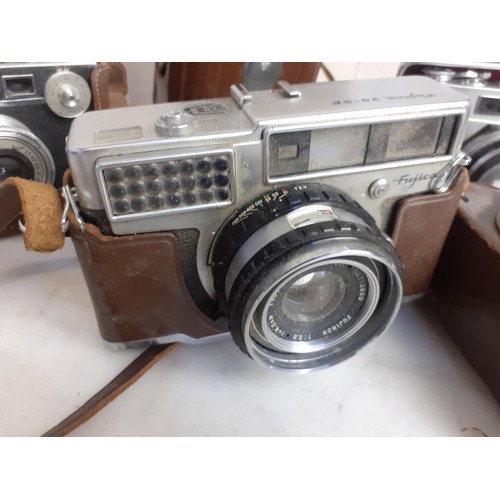 132 - 4 VINTAGE CAMERAS