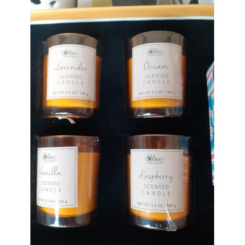 44 - 3 NEW BOXED CANDLES