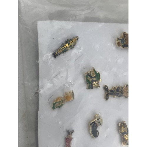 50 - A SET OF 14 COLLECTORS BADGES