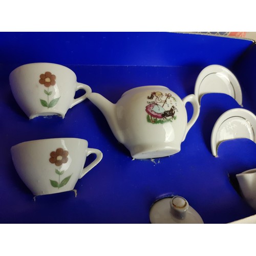 53 - A BOXED MINI VINTAGE TEA SERVICE