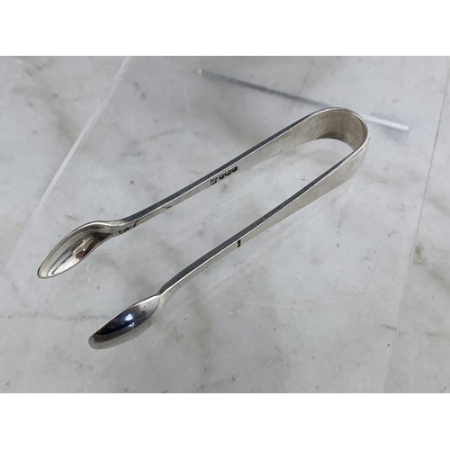 222 - A PAIR OF SHEFFIELD SILVER TONGS 19.2grms