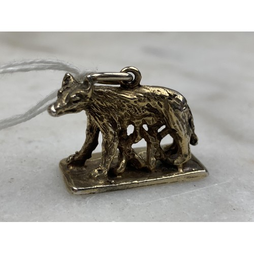 225 - A LARGE SILVER GILT CHARM 