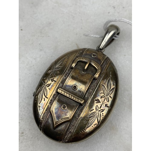 239 - A LARGE VICTORIAN OVAL SILVER LOCKET