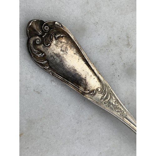 256 - A BEAUTIFULLY EMBOSSED SILVER SPOON 80.3 GRAMS