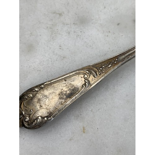 256 - A BEAUTIFULLY EMBOSSED SILVER SPOON 80.3 GRAMS