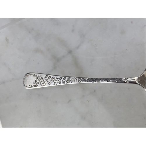 259 - A SHEFFIELD SILVER TEASPOON WITH  FLORAL AND SWALLOW EMOBSSED