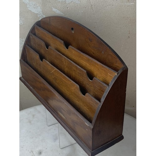 265 - AN ANTIQUE OAK DESK TIDY