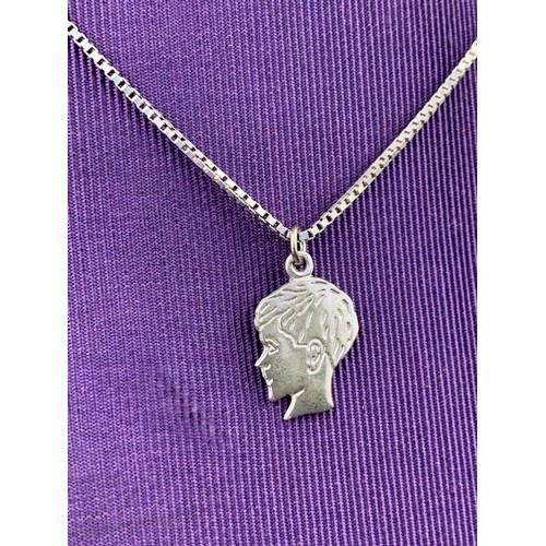 280 - A SILVER BOY PENDANT ON A SILVER CHAIN