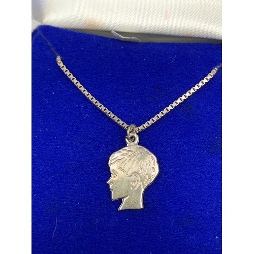 280 - A SILVER BOY PENDANT ON A SILVER CHAIN