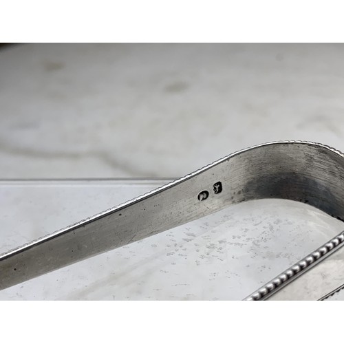 301 - A PAIR OF SILVER SUGAR TONGS 34.4grms