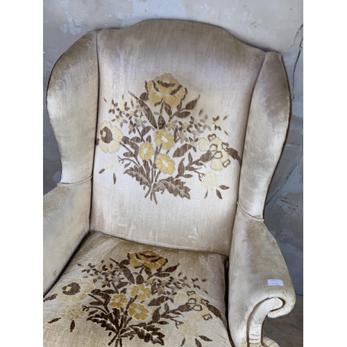 354 - AN ANTIQUE SHAPED NEEDLEWORK ARMCHAIR