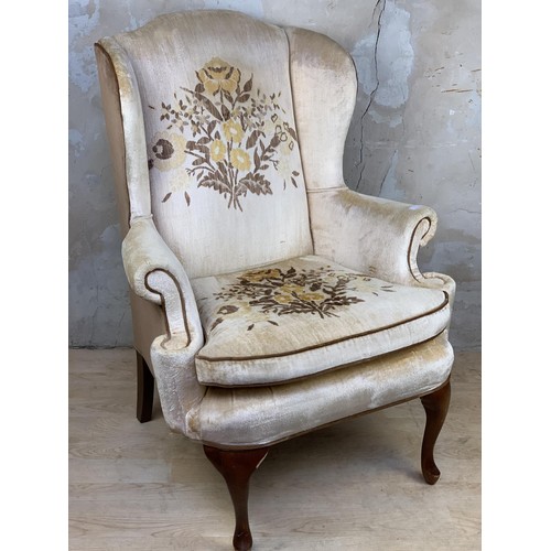 354 - AN ANTIQUE SHAPED NEEDLEWORK ARMCHAIR