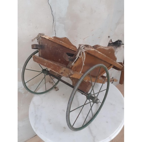 358 - A VINTAGE HANDMADE MODEL CART WITH METAL WHEELS