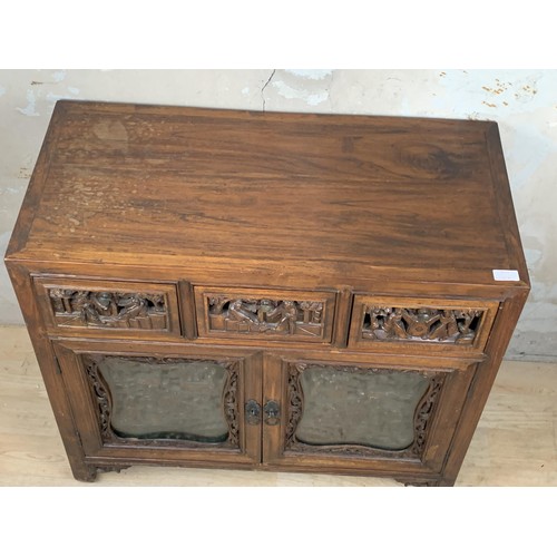 365 - MAHOGANY CARVED ORIENTAL 3 DRAWERED SIDEBOARD OVER 2 DOOR WITH GLASS FRONTS 32 X 29 X 16