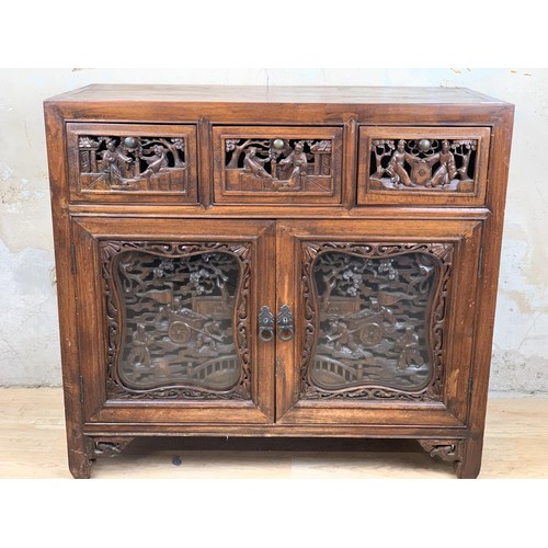 365 - MAHOGANY CARVED ORIENTAL 3 DRAWERED SIDEBOARD OVER 2 DOOR WITH GLASS FRONTS 32 X 29 X 16