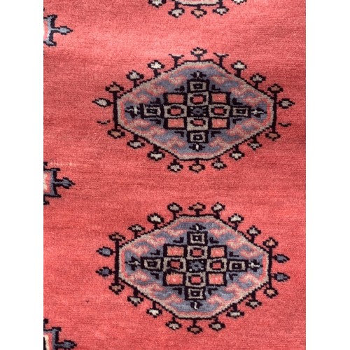 369 - A SMALL HAND KNOTTED ORIENTAL RUG 38 X 18