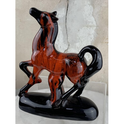 379 - A GLAZED TERRACOTTA HORSE 8