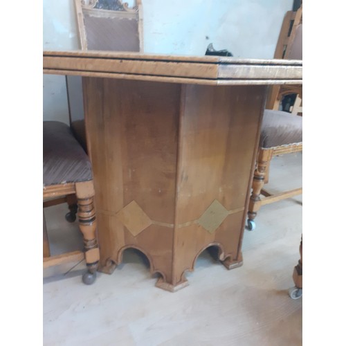 382 - A HEXAGONAL INLAID INDIAN WOOD TABLE WITH HEAVILY CARVED BACKED CHAIRS