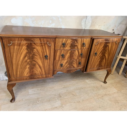 385 - A 3 DRAWERED 2 DOOR FLAME MAHOGANY SIDEBOARD