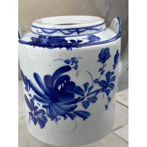 395 - AN ANTIQUE HAND PAINTED BLUE AND WHITE TEAPOT 6