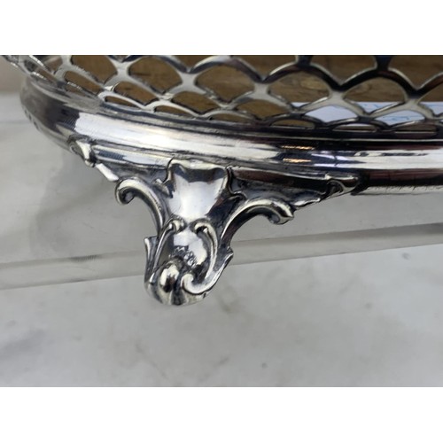 397 - PIERCED WHITE METAL BASKET ON POD QUAD FOOT