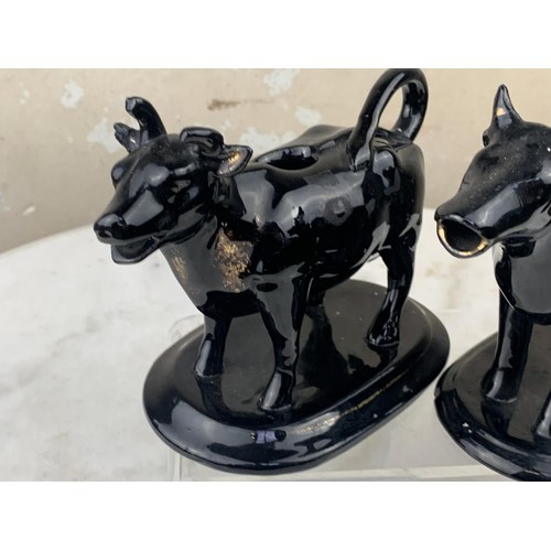 399 - PAIR OF ONYX GLASS COW CREAM POURERS 5