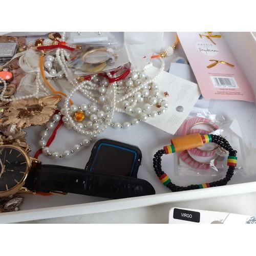 439 - A BOX OF COSTUME JEWELLERY