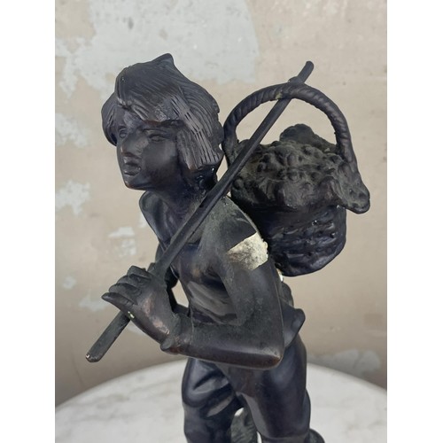 486 - AN ANTIQUE BRONZE FIGURE OF BOY FRUIT CARRIER 14