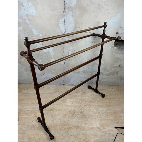 528 - A TALL VICTORIAN TOWEL RAIL WITH A TRIPLE TOP