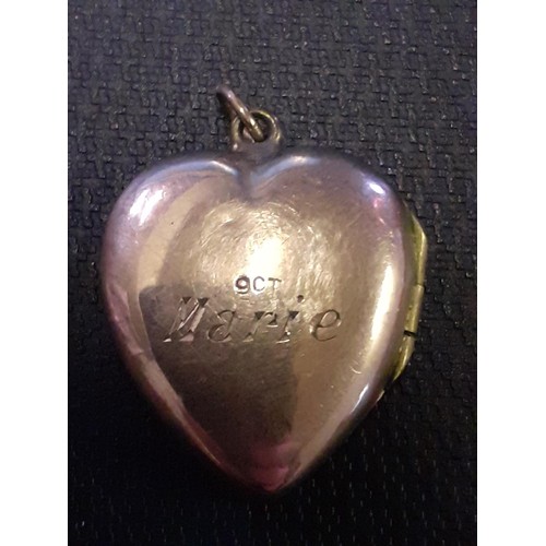 298 - AN ENGRAVED 9ct GOLD LOCKET WEIGHS 3.7G