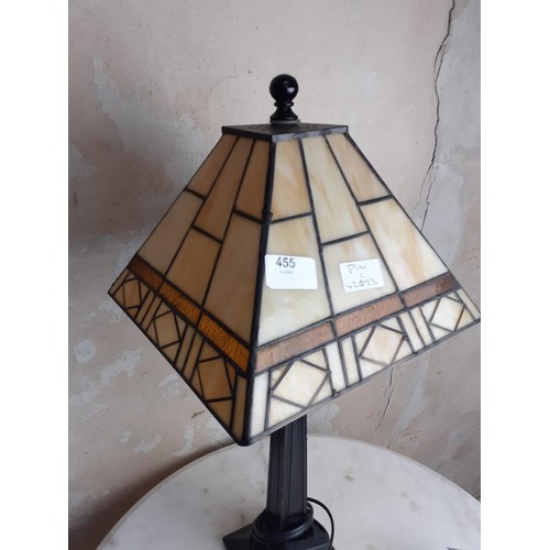 455 - A TALL TIFFANY STYLE LAMP ON A BRONZED BASE 22