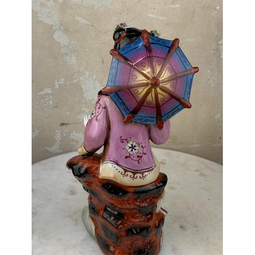 100A - A CHINESE PORCELAIN LADY WITH PARASOL 13