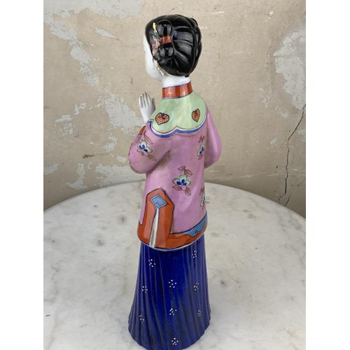 180A - A CHINESE PORCELAIN LADY 17