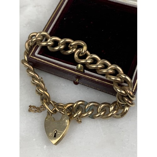 253A - A HEAVY CURB LINK BRACELET WITH HEART PADLOCK CATCH