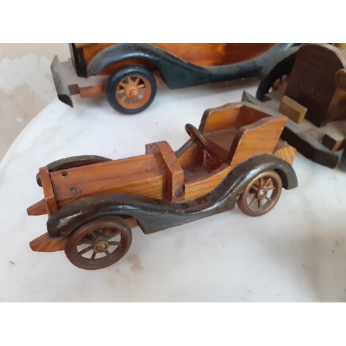 57 - 4 VINTAGE HAND CRAFTED WOODEN CARS