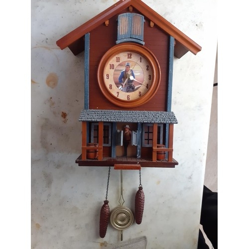 62 - JOHN WAYNE CUCKOO CLOCK