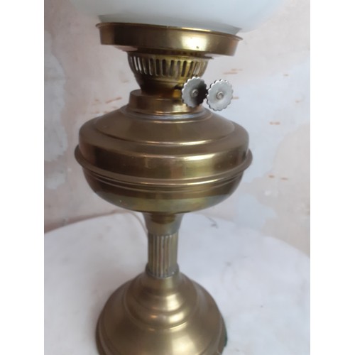 74 - BRASS CONVERTED OIL LAMP WITH MILK GLASS SHADE